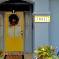 Yellow Door of Brick and Stucco Home